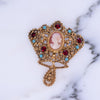 Vintage Florenza Crown Brooch with Cameo and Turquoise Beads and Garnet Red Rhinestones by Vintage Meet Modern - Vintage Meet Modern Vintage Jewelry - Chicago, Illinois - #oldhollywoodglamour #vintagemeetmodern #designervintage #jewelrybox #antiquejewelry #vintagejewelry