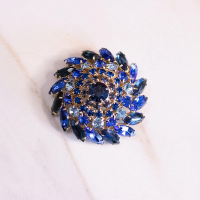 Vintage Light and Dark Blue Rhinestone Pinwheel Medallion Brooch by Unsigned Beauty - Vintage Meet Modern Vintage Jewelry - Chicago, Illinois - #oldhollywoodglamour #vintagemeetmodern #designervintage #jewelrybox #antiquejewelry #vintagejewelry