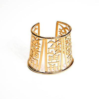 Wide Gold Tone Asian Theme Cuff Bracelet by Napier by Napier - Vintage Meet Modern Vintage Jewelry - Chicago, Illinois - #oldhollywoodglamour #vintagemeetmodern #designervintage #jewelrybox #antiquejewelry #vintagejewelry