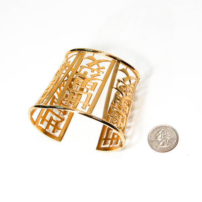 Wide Gold Tone Asian Theme Cuff Bracelet by Napier by Napier - Vintage Meet Modern Vintage Jewelry - Chicago, Illinois - #oldhollywoodglamour #vintagemeetmodern #designervintage #jewelrybox #antiquejewelry #vintagejewelry